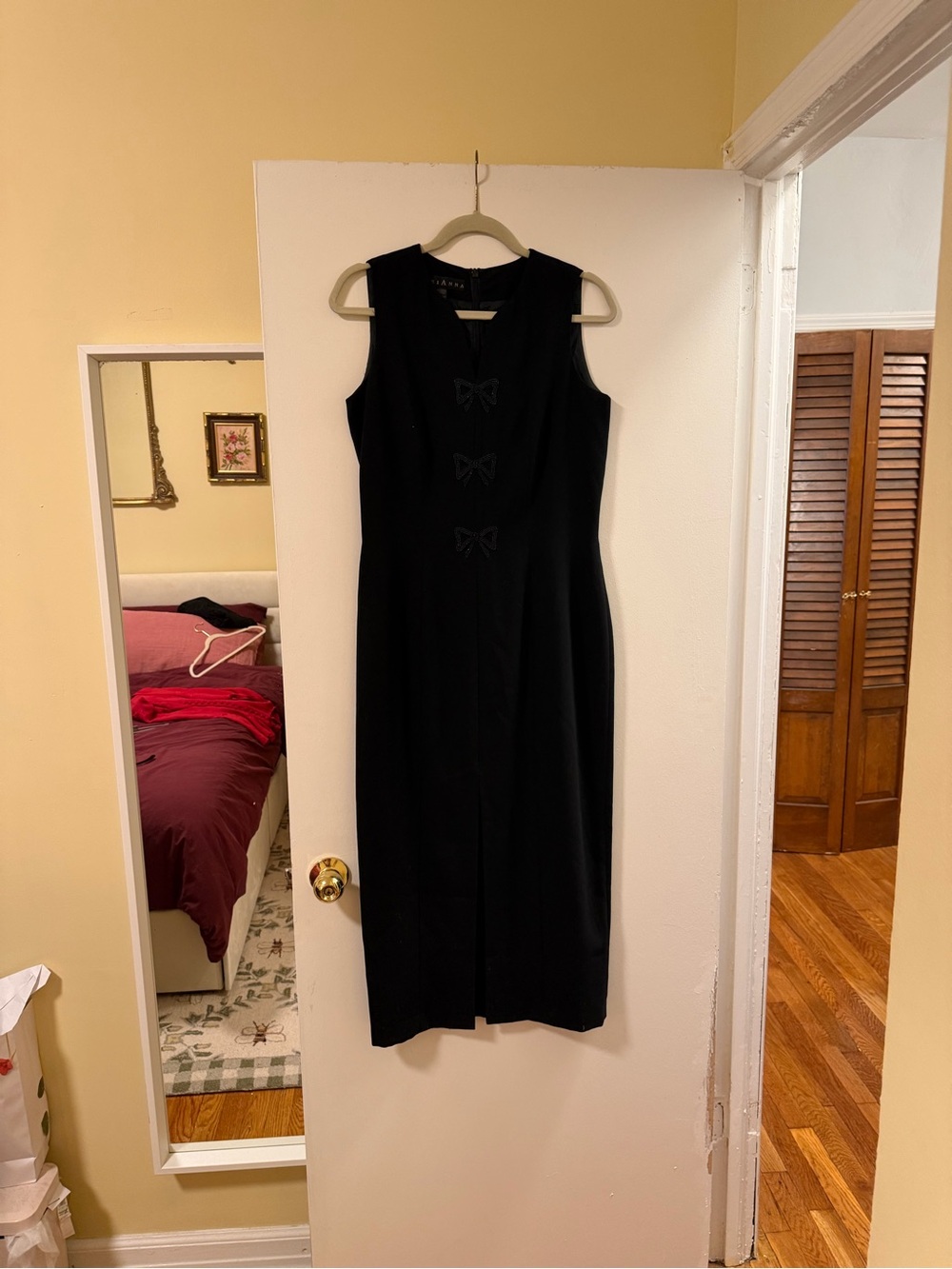 Mariana Black Sleeveless Midi Dress with Front Bow Accents